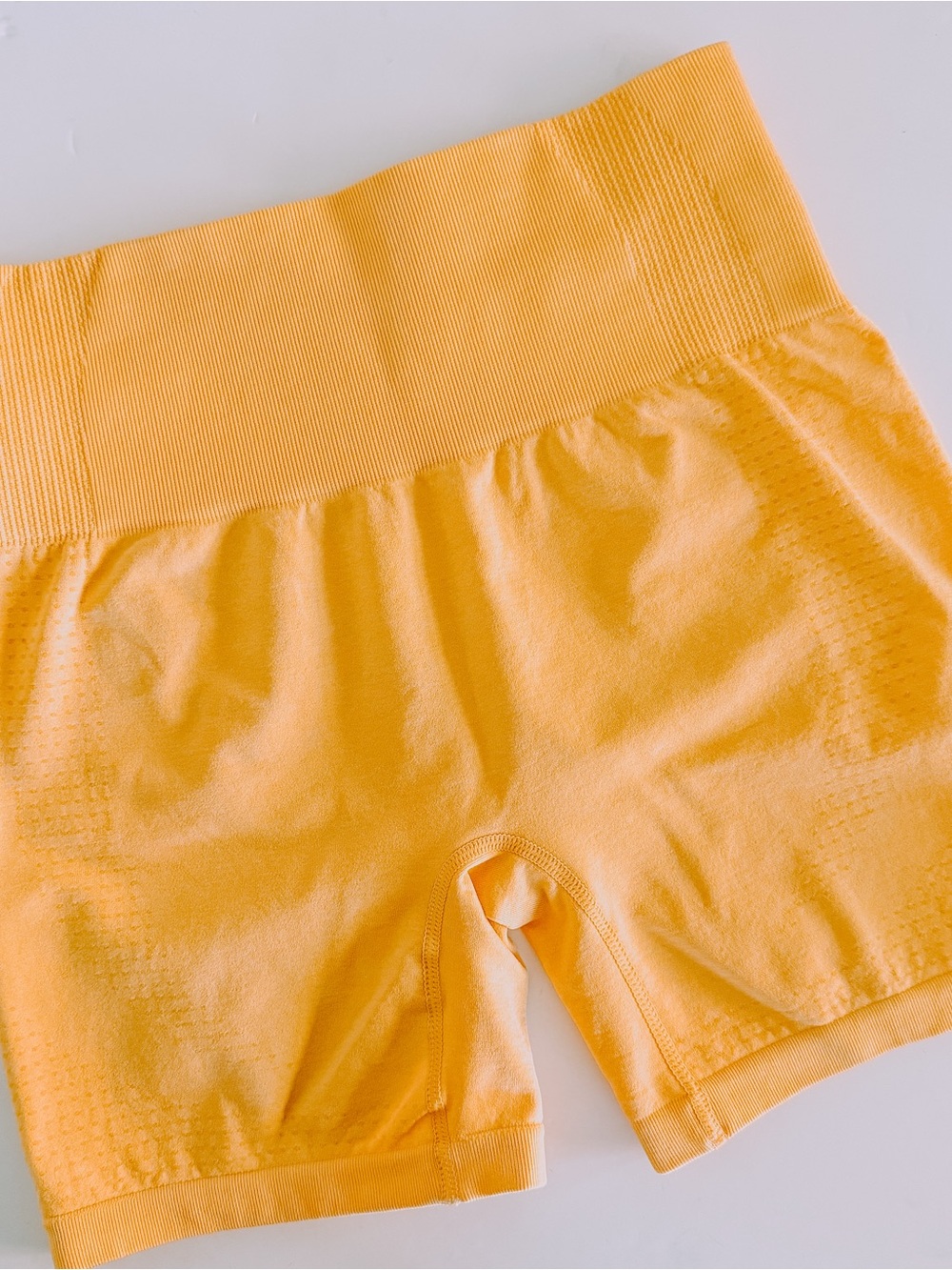 No Brand Yellow Seamless Shorts. Size No tag, but fits like a small.